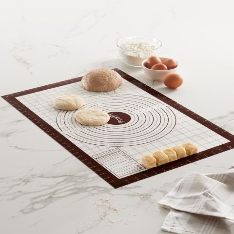 Non-stick pastry mat with measures, 24" x 16" Silicone pastry mat with measurements.