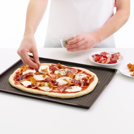 Rectangular Pizza Crisper Mat Bake delicious home-made pizza with a crispy finish.