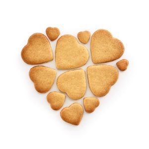 Cookie Puzzle Corazón 12 galletas con forma de corazón de un solo corte sobre la masa.