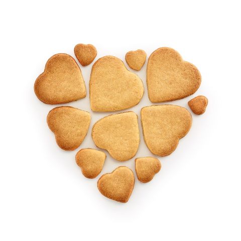 Puzzle Hearts Cookie Cutter 12 heart-shaped cookies with one cut of the dough.