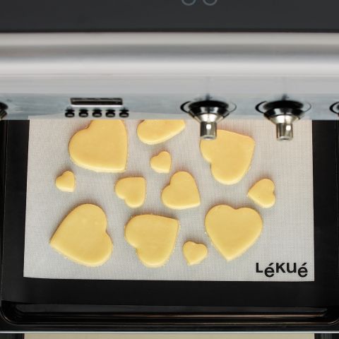 Puzzle Hearts Cookie Cutter 12 heart-shaped cookies with one cut of the dough.