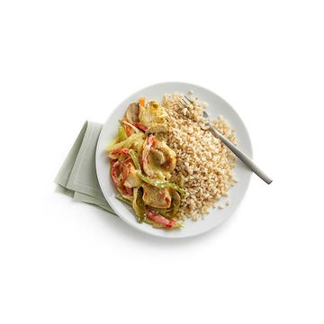 Curried brown rice with vegetables and chicken