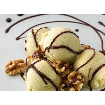 Vanilla ice cream with caramelized nuts and chocolate sauce