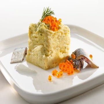 Omelette with sour cream and dill, served with smoked herring and trout roe
